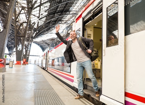 Photo: Happy middle-aged traveler meeting someone Happy middle-aged traveler meeting someone