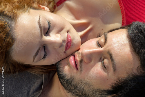 Photo: Attractive young couple sleeping Attractive young couple sleeping