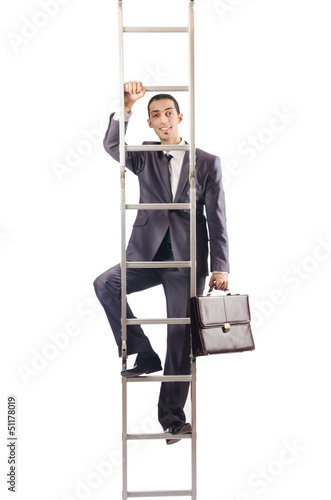 Photo: Businessman climbing the ladder isolated on white Businessman climbing the ladder isolated on white