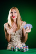 Woman in casino playing cards