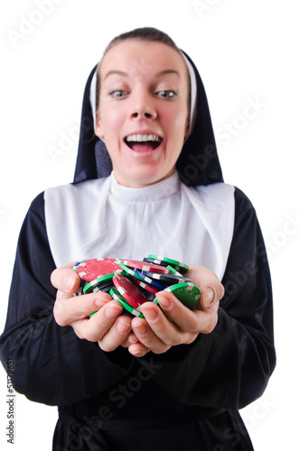 Photo: Nun in the gambling concept Nun in the gambling concept