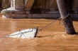 Sinking boat chained to a tree being dragged by the water
