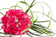 Photo: wedding rings and bridal bouquet of pink roses isolated over whi wedding rings and bridal bouquet of pink roses isolated over whi