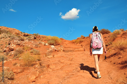 Photo: Pink Backpack Woman on the path Pink Backpack Woman on the path