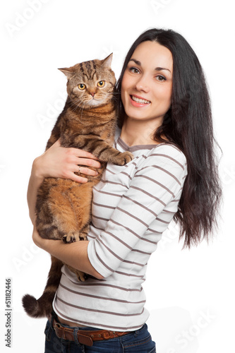 Photo: beautiful smiling brunette girl and her ginger cat over white ba beautiful smiling brunette girl and her ginger cat over white ba