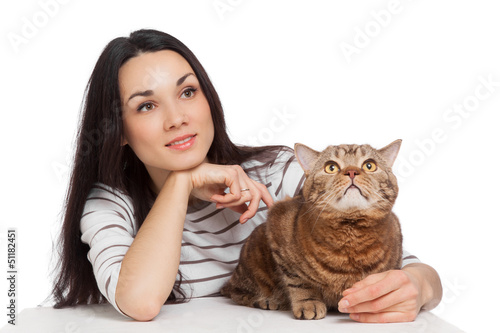 Photo: beautiful smiling brunette girl and her ginger cat over white ba beautiful smiling brunette girl and her ginger cat over white ba