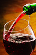 Red wine being poured into wine glass