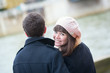 Dating couple outdoors, girl is smiling