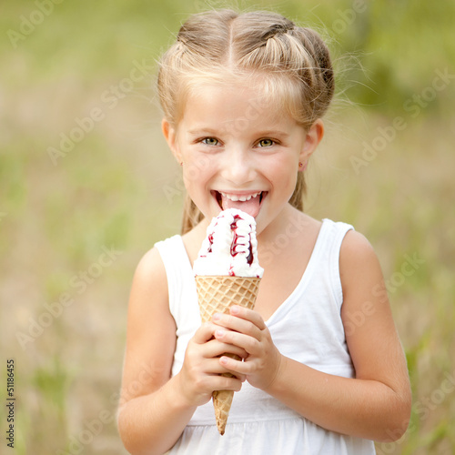 Photo: little girl with ice-cream little girl with ice-cream