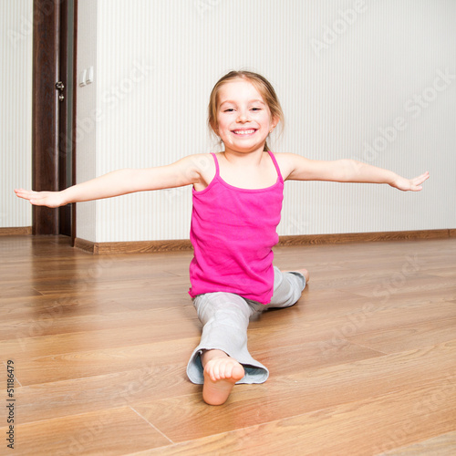 Photo: little girl engaged in fitness little girl engaged in fitness