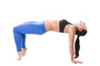 Sexy young yoga woman doing yogic exercise on isolated
