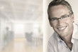Great looking young man with perfect smile in trendy glasses