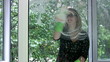 Girl washing window