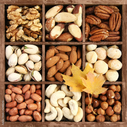 Photo: Assorted nuts in a wooden box Assorted nuts in a wooden box
