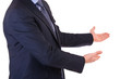 Business man with welcoming gesture.