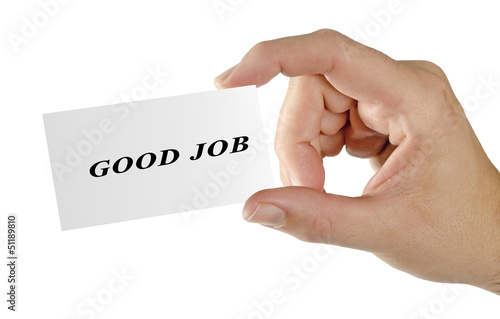 Photo: Hand with card GOOD JOB Hand with card GOOD JOB