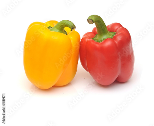 Photo: fresh yellow and red bell peppers isolated on white fresh yellow and red bell peppers isolated on white