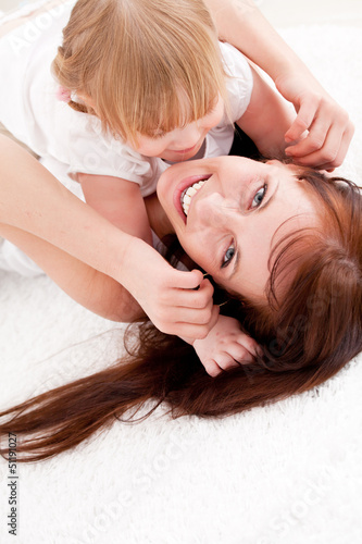 Photo: Mother and daughter at home Mother and daughter at home