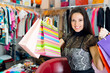 Beautiful smiling young girl with shopping bags