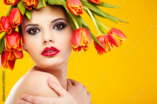 Photo: beauty woman portrait with wreath from flowers on head ogange b beauty woman portrait with wreath from flowers on head ogange b