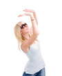 woman is holding something abstract above her head