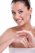Woman applying cream on hands