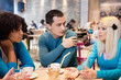 young friends enjoy in coffee
