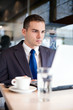 Photo: Businessman using laptop computer Businessman using laptop computer