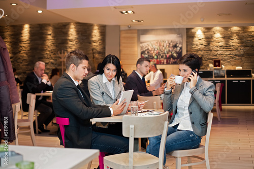 Photo: Relaxed business team on meeting Relaxed business team on meeting