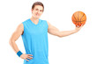 A basketball player posing