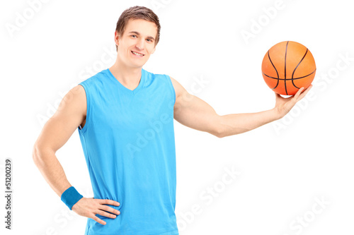 Photo: A basketball player posing A basketball player posing
