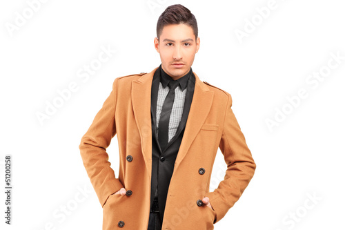 Photo: A handsome smiling man wearing coat A handsome smiling man wearing coat