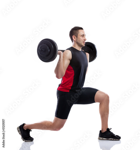 Photo: Young man weights training Young man weights training
