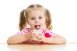 child drinking yogurt or dairy product