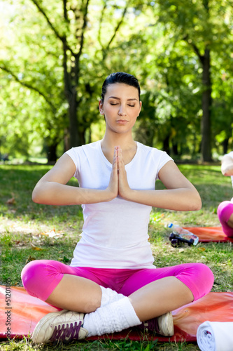 Photo: Young girl relax with yoga. Young girl relax with yoga.