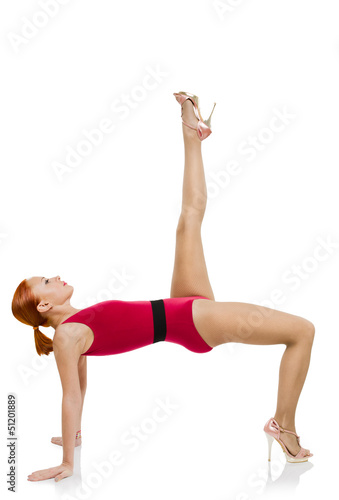 Photo: Beautiful fitness woman performing handstand Beautiful fitness woman performing handstand