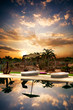 Beach beds with next at pool.