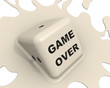 Надпись "GAME OVER" на грани расплавившейся игральной кости