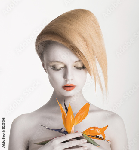 Photo: Bodyart. Fancy Daydreaming Woman with Exotic Flower. Allure Bodyart. Fancy Daydreaming Woman with Exotic Flower. Allure