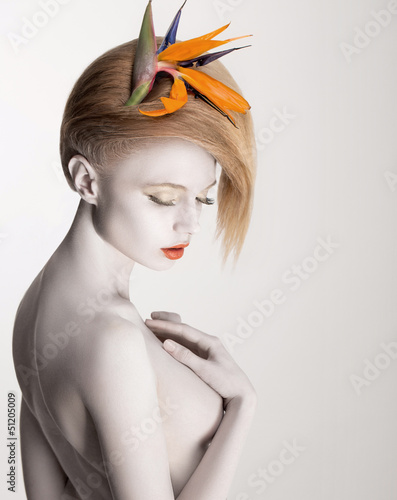 Photo: Bodypainting. Dreamy Woman with Flower. Futurism. Silver Skin Bodypainting. Dreamy Woman with Flower. Futurism. Silver Skin