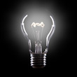 Light bulb on black background