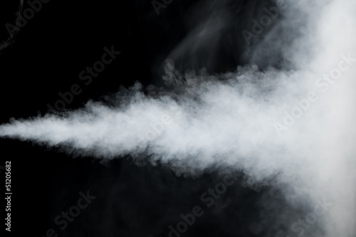 Fototapeta white smoke trail isolated on black