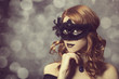 Beautiful women in carnival mask.