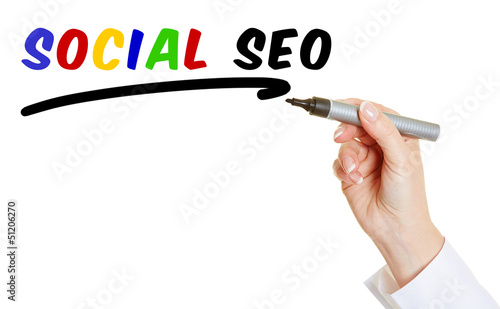 Photo: Hand mit Stift schreibt Social SEO Hand mit Stift schreibt Social SEO