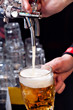 Foto: pouring beer into the glass pouring beer into the glass