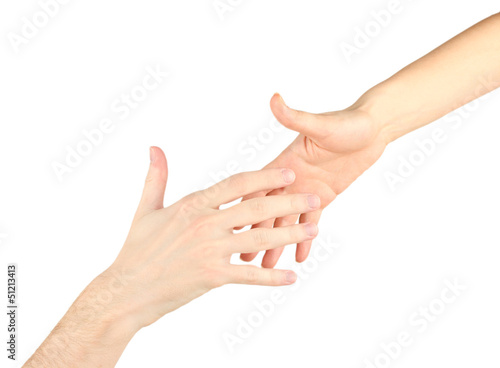 Photo: Women's hand goes to the man's hand on white background Women's hand goes to the man's hand on white background