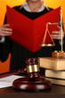 Judge read verdict on orange background