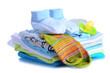 Pile of baby clothes isolated on white