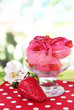 Delicious ice cream on table on bright background