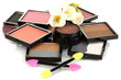 Bright eye shadows and sponge brushes for foundation isolated